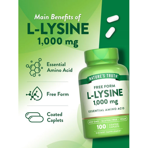 View 5 A hand holds two white L-Lysine 1,000 mg coated caplets.