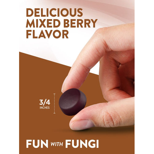 A delicious mixed berry flavored gummy, measuring 3/4 inches, is held between fingers.