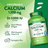 Two white Quick Release Softgels containing Calcium 1,200 mg plus D3 5,000 IU on a hand scale.