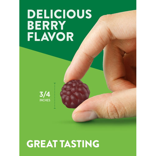 A dark red, berry-shaped gummy held in a hand, measuring 3/4 inches. Text: DELICIOUS BERRY FLAVOR, GREAT TASTING.