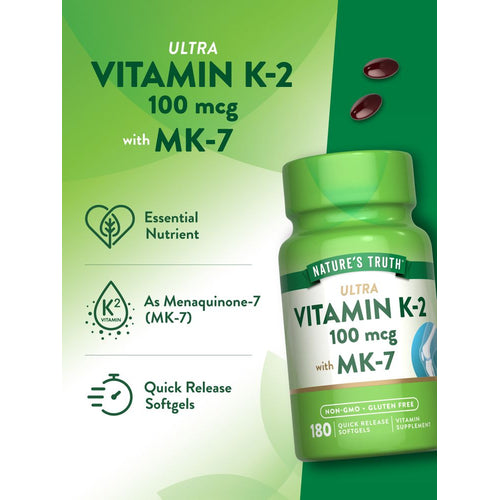View 5 A hand holding a bottle of dark red Vitamin K-2 100 mcg Softgels next to a scale, displaying bulk measurement.