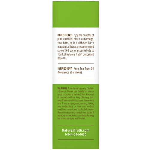 A 15 mL bottle of tea tree oil placed on a hand scale for measurement.