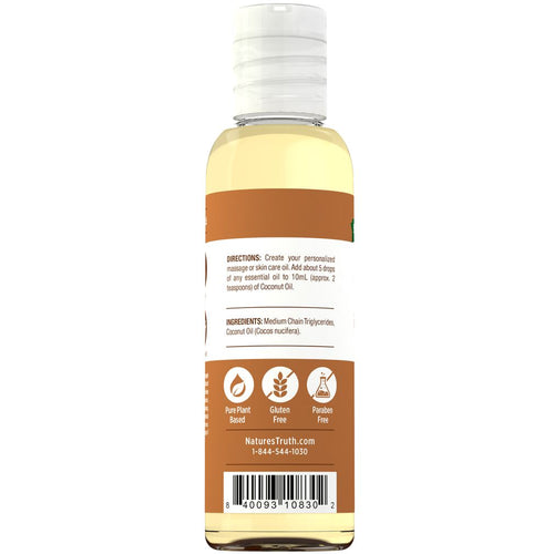 A 4 oz liquid bottle of coconut oil on a hand scale with visible measurement readings, emphasizing precise weight control.