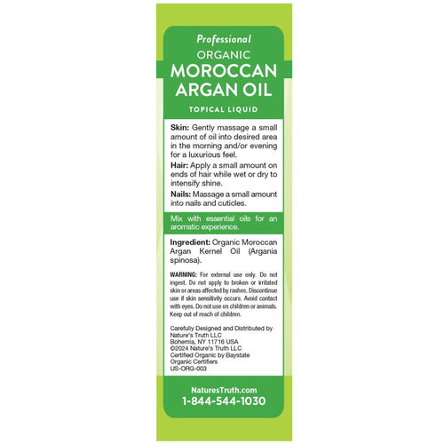 Label for Professional Organic Moroccan Argan Oil Topical Liquid product in bulk format on a hand-held scale.