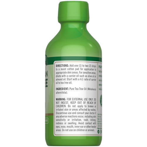 Green bottle of Pure Tea Tree Oil (Melaleuca alternifolia) with directions, ingredient, and warning for external use on its label.