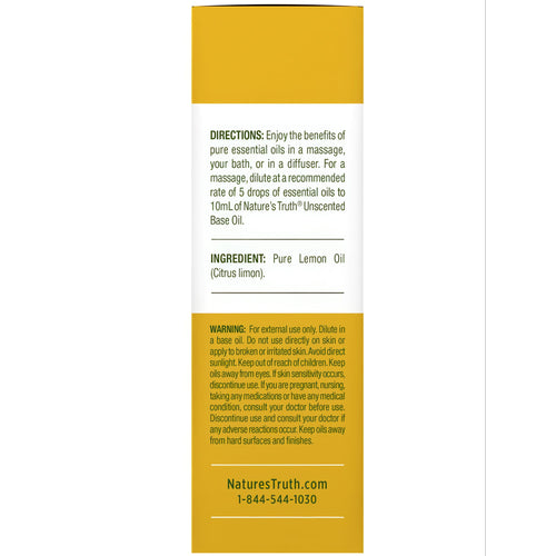 NT Lemon Oil 15 mL bottle showing label with usage instructions, ingredients list, and safety warnings.