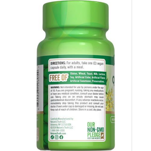 View 7 Hand holding a scale with NT Quercetin vegan capsule, showing one capsule for dietary supplement use.