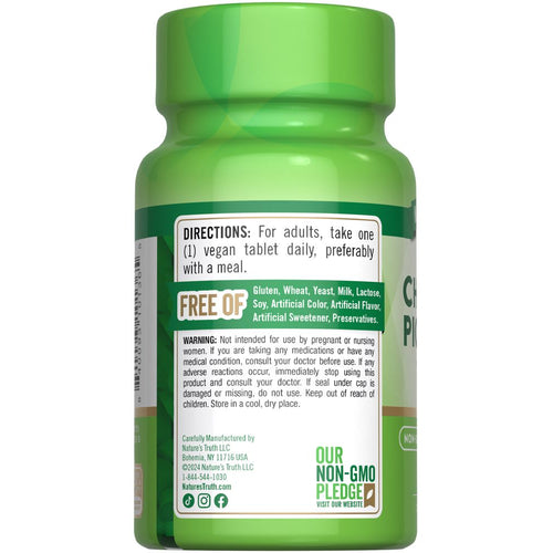 View 7 A hand holding a vegan Chromium Picolinate 1000 mcg tablet.
