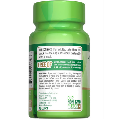 View 7 Hand holding NT Hyaluronic Acid 900 mg capsules for quick release.