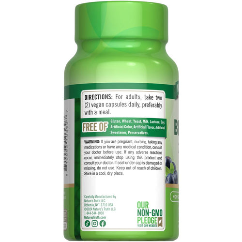Hand holding Bilberry Extract 2400 mg, featuring 100 vegan capsules bottle. Dietary supplement for eye health and antioxidant support.
