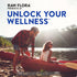 Young couple smiling by a lake with canoes, promoting 'RAW FLORA PROBIOTIC-25 UNLOCK YOUR WELLNESS'.