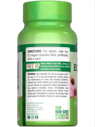 Hand holding a bottle of NT Echinacea 1300 mg, containing 100 vegan capsules, visible against a bulk scale background.